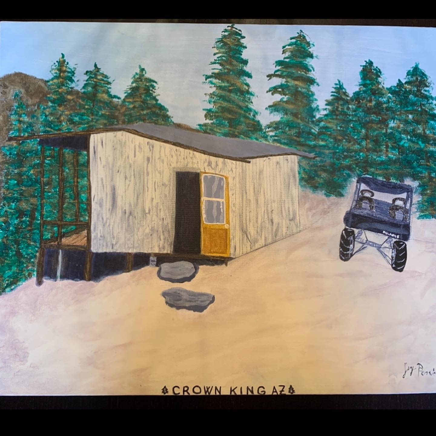 Small cabin and vehicle in a clearing surrounded by pine trees